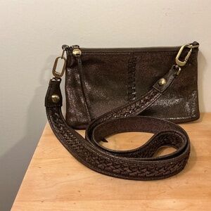 Hobo metallic Clutch purse with braided strap.